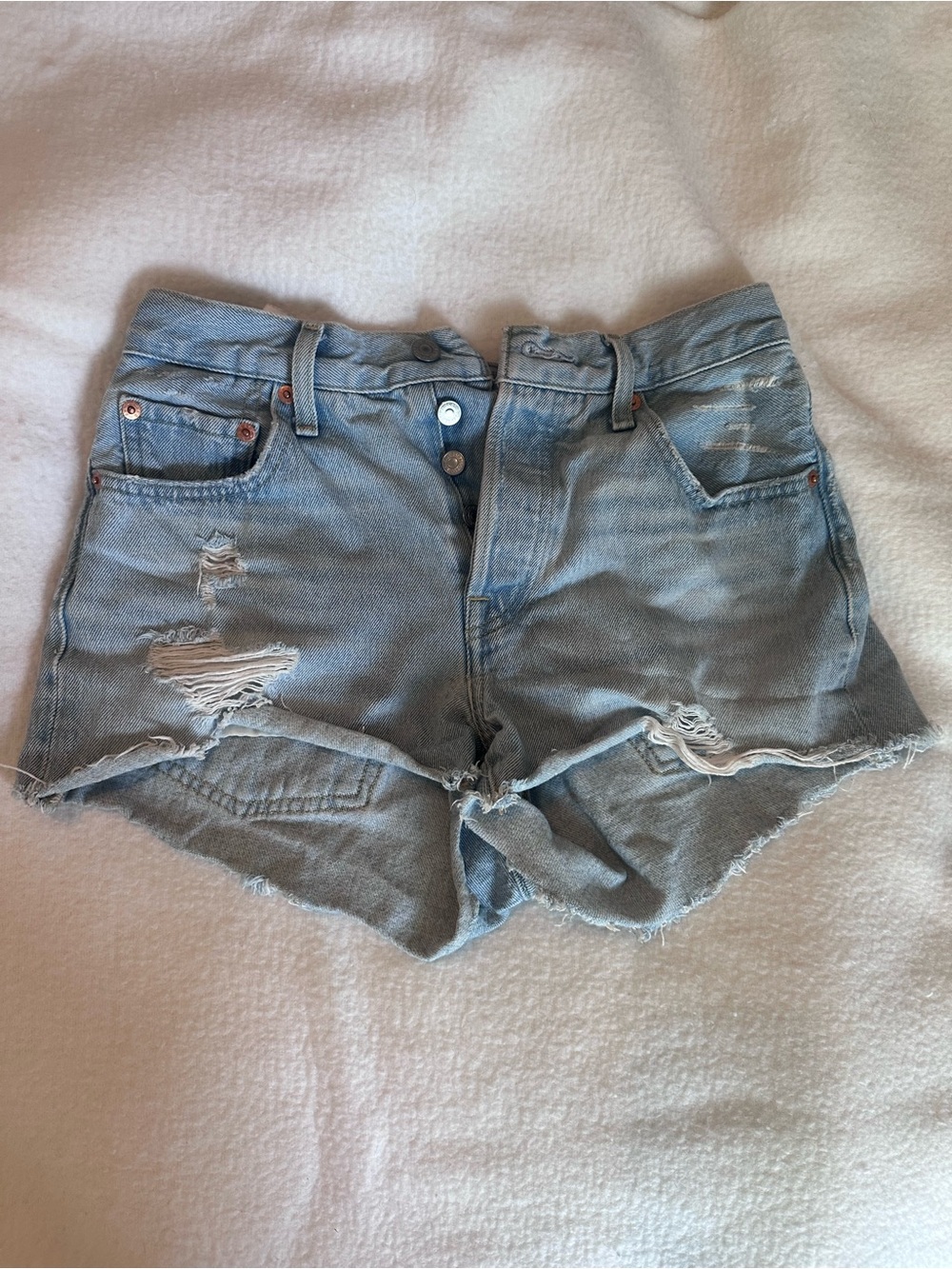 Levi’s Light Blue Distressed Denim Shorts